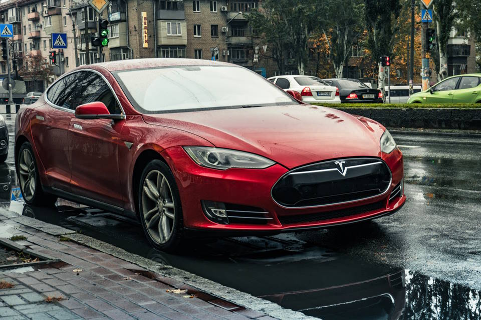 Why Do Tesla Owners Tap the Charger?